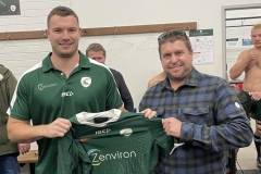 Matt Davis  of NBS Bricklaying handing jersey to Brenton Gibson