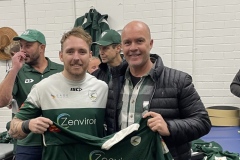 Rod Hood of Pacific Hydraulics handing jersey to Jason Milligan