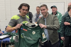 Stewart Gilberd of ISC handing jersey to Jock Wait