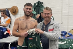 Darren Herbert of Newcastle Commercial Finance handing jersey to Sam Rouse
